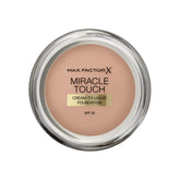 Max Factor Miracle Touch foundation bottle with pump for easy daily application.