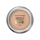 Max Factor Miracle Touch foundation bottle close-up in Warm Almond for even complexion.