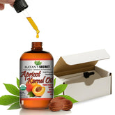 Mayan's Secret apricot oil bottle with dropper in amber glass for daily hydration.