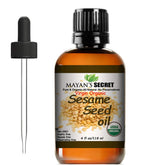 Mayan's Secret sesame oil in amber bottle with dropper for precise skincare application.