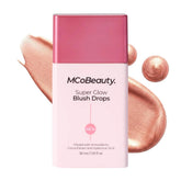 MCoBeauty Super Glow Blush Drops bottle with peachy pink shimmer for dewy cheeks
