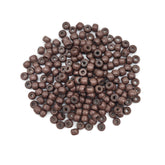 Medsuo nano ring beads in black close-up demonstrating secure grip for extensions