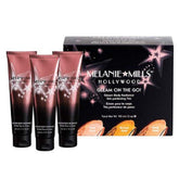 Melanie Mills Hollywood Gleam on the Go Rose Gold bottle for a subtle natural glow