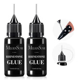 MelodySusie rhinestone glue pen-tip application for precise nail art.