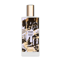 Memo Paris Ithaque bottle close-up highlighting cedar and bergamot balance for daytime freshness.