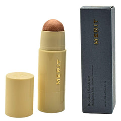 Merit Day Glow Dewy Balm on the cheekbone for natural rose-gold radiance.