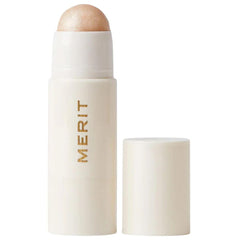 Merit Day Glow Dewy Highlighting Balm Cava bottle close-up for natural daytime radiance