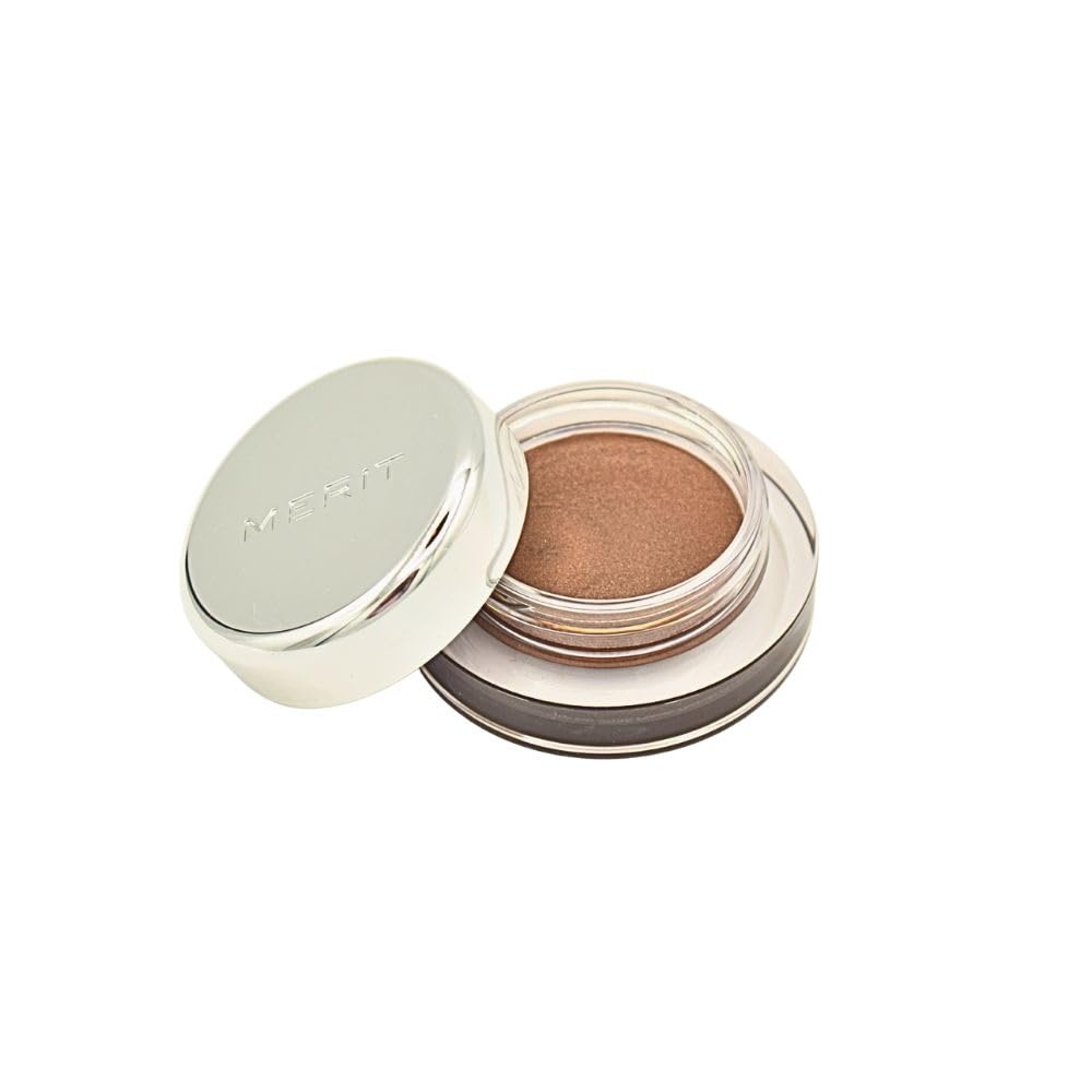 Merit Solo Shadow Eyeshadow Sartorial Bronze compact shows pearlescent finish for everyday bronze glow.
