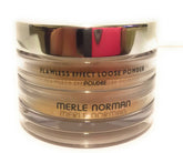 Merle Norman Flawless Effect Loose Powder Nearly Nude jar for a smooth, luminous finish.