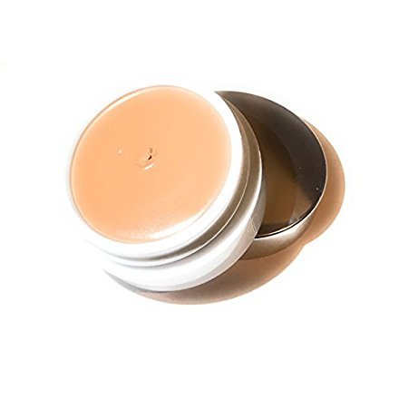 Merle Norman Powder Base Foundation bottle in Pure Beige for medium to full coverage and dewy finish