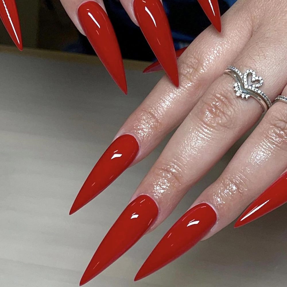 MERVF stiletto press-on nails in red almond shape for a quick chic manicure