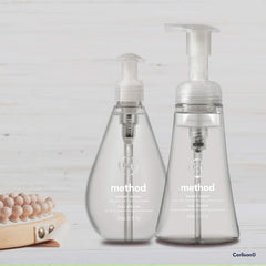 Foaming lather from Method Sweet Water soap shown on hands.