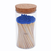 Meya Luxury colored safety matches in blue glass jar for elegant lighting.