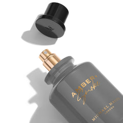 Amber + Smoke citrus opening emphasizes saffron and lemon zest for daytime wear.