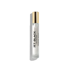Michael Malul Jet Black Intense travel-size bottle close-up with sleek cap