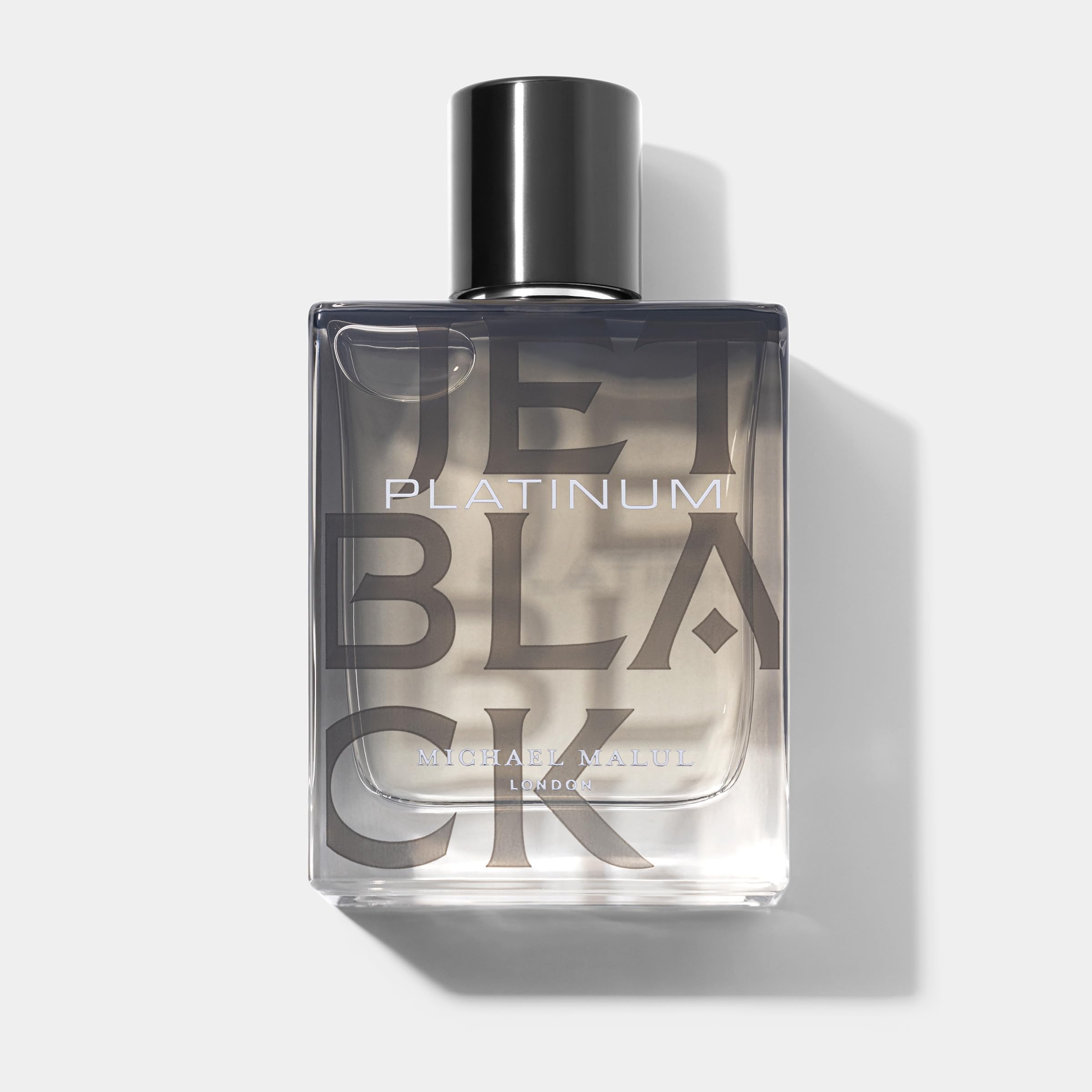 Michael Malul Jet Black Platinum bottle front view showing bold, sophisticated design