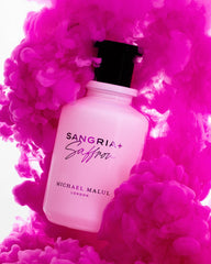 Michael Malul Sangria + Saffron travel-size bottles with full-size for on-the-go scent.