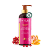 Mielle Organics Pomegranate & Honey detangling conditioner bottle provides hydrated curls.
