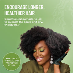 Mielle Organics Rosemary & Mint Pomade applied to scalp delivers hydrated roots.