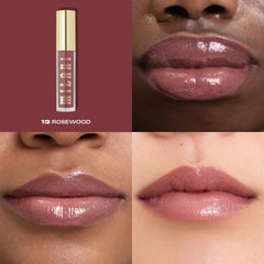 Milani Keep It Full applicator applying smooth gloss