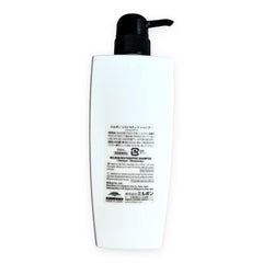 Milbon Repair Restorative Shampoo lather in hands, delivering a silky cleanse.