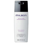 Milbon Volumizing Shampoo bottle pouring to show cleansing action and prepared-for-styling body.