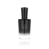 MIND GAMES Kingside bottle pour showing refined amber woody allure for evening wear.
