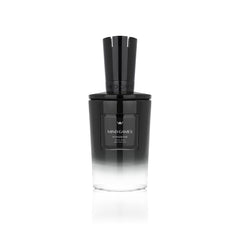MIND GAMES Kingside bottle pour showing refined amber woody allure for evening wear.