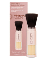 Mineral Fusion brush-on sunscreen bottle offers weightless SPF 30 protection.