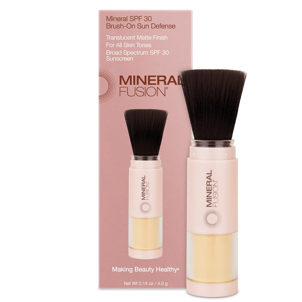 Mineral Fusion brush-on sun defense compact for on-the-go UV protection and shine control.
