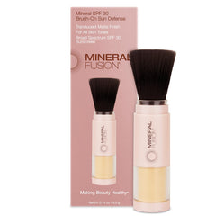 Mineral Fusion brush-on sun defense compact for on-the-go UV protection and shine control.