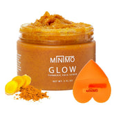 Minimo Glow Turmeric Face Scrub jar close-up showing creamy texture for gentle exfoliation
