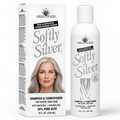 Miracle of Aloe Softly Silver shampoo bottle pour shows vibrant gray hair care use.