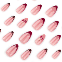Mivota almond nails with red French tips for bold style