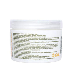 Mixed Chicks detangling deep conditioner in use, smoothing knots and adding moisture
