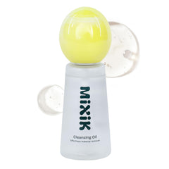 Mixik Deep Oil Cleanser Spray bottle demonstrates gentle and thorough makeup removal.