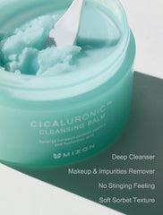 Texture close-up shows creamy balm that melts makeup smoothly.