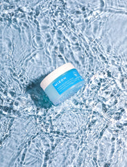 MIZON Water Volume EX Cream application rub demonstrates moisture release during massage.
