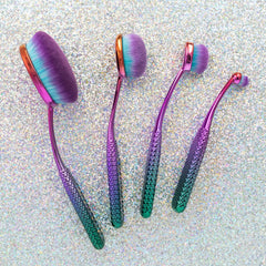 MODA Prismatic blush/bronzer brush blends powder for natural warmth.