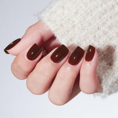 Modelones brown press-on nails displayed in 16 sizes for a precise fit.