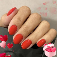 Modelones red short press-on nails oval packaging showcases the full kit for at-home manicure convenience.