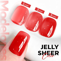 Modelones sheer red closeup showing natural nail visibility and tone