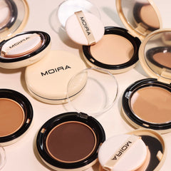 Moira Complete Wear Powder Foundation being applied with the included applicator for buildable coverage