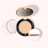 Moira Complete Wear Foundation compact close-up showing natural matte coverage on the go.