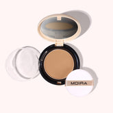 Moira Complete Wear Powder Foundation jar showing buildable coverage and natural matte finish.