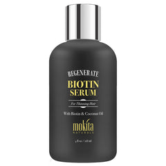 Mokita Naturals Hair Growth Serum bottle closeup showing weightless, non-greasy formula for daily use.