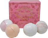 Mom Bomb Mistletoe Kisses bath bomb in gift set delivers seasonal aroma for a relaxing bath.