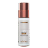 Mon Platin Color Save Serum bottle pouring for vibrant color protection and shine