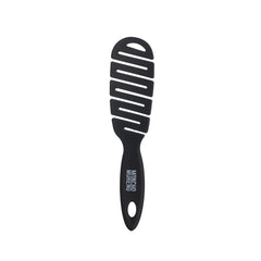 Moncho Moreno Mini Magic Brush travel-size detangler for on-the-go styling and frizz control.