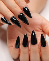 Morily 24Pcs black press-on nails in stiletto shape, medium length, glossy finish.